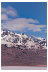 a snow capped mountain in the distance