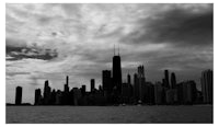 a black and white photo of the chicago skyline